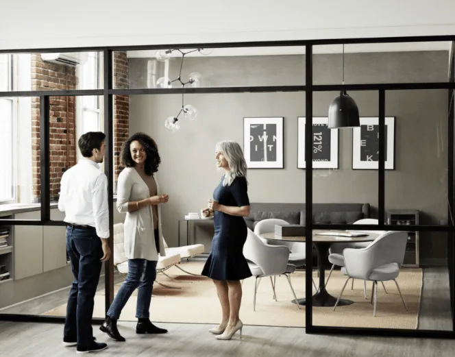 Real estate professionals meeting in a modern office
